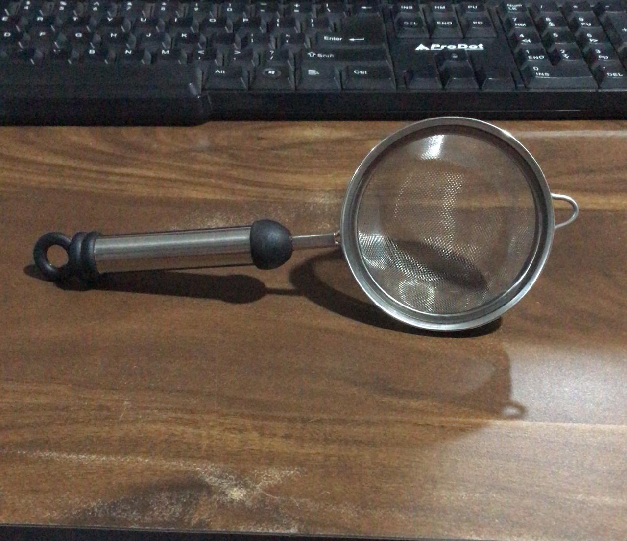Stainless steel strainer with fine mesh for soups and juices Stainless steel strainer with fine mesh for soups and juices